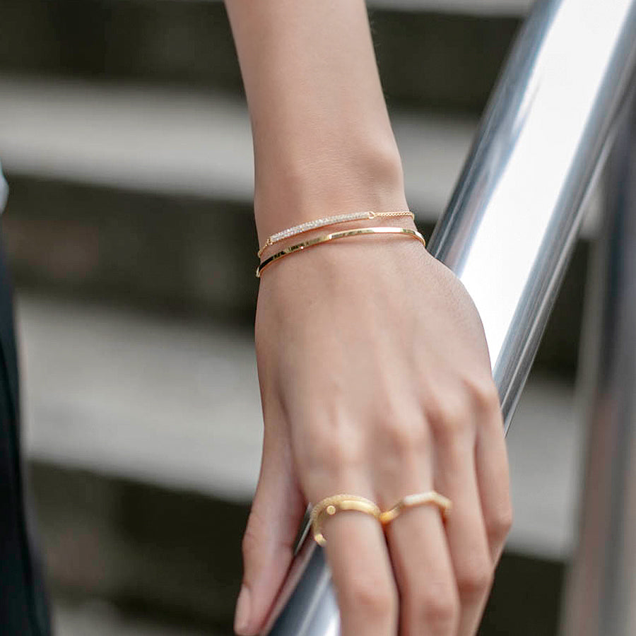 gold curved bar bracelet